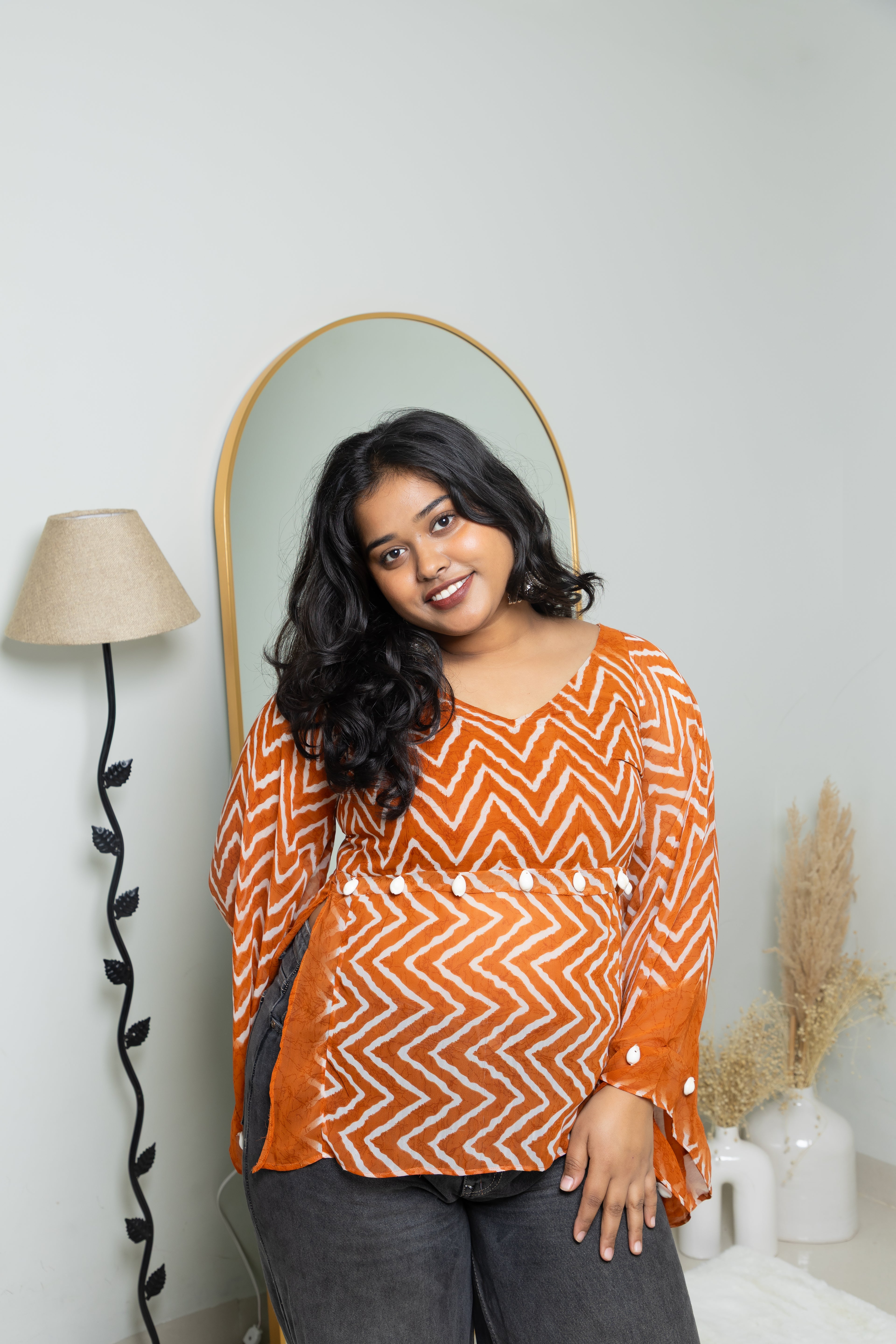 Narangi Lahar Peplum Top