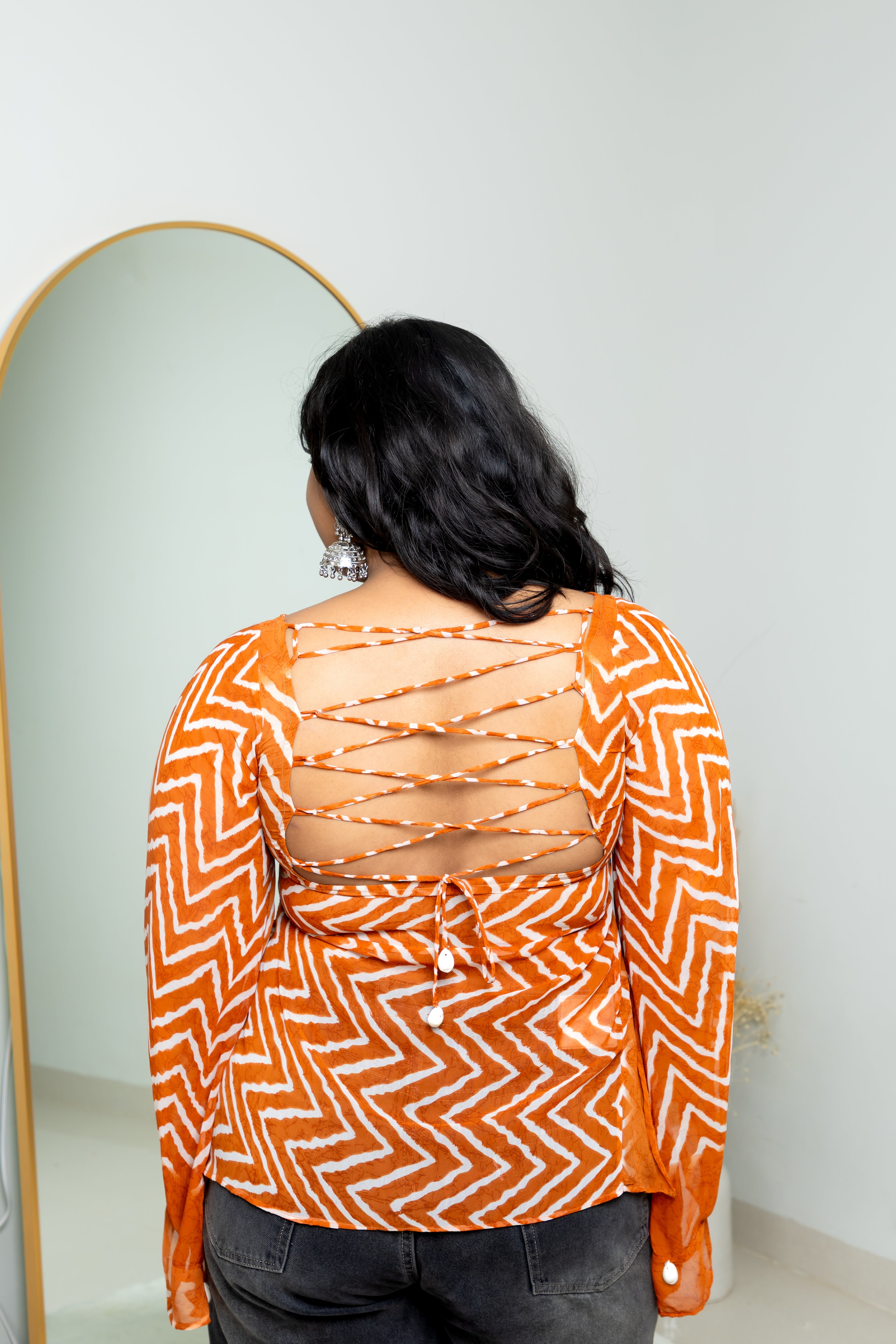 Narangi Lahar Peplum Top